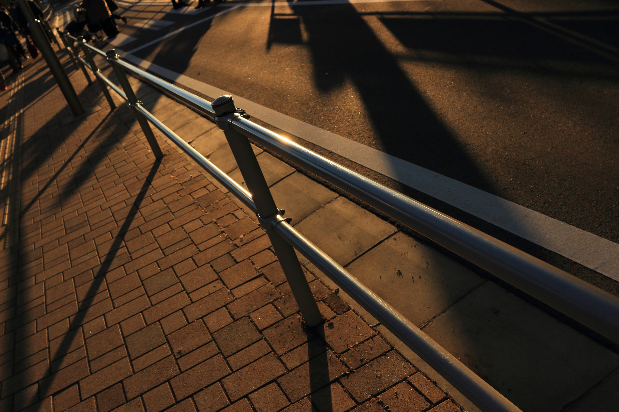 Canon EF-S 24mm F2.8 STM sample photo. Shadows on orange road photography