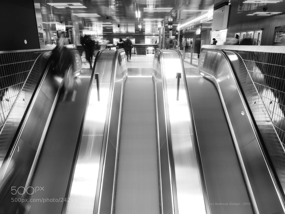 Olympus OM-D E-M10 II sample photo. Marienplatz split level escalator photography