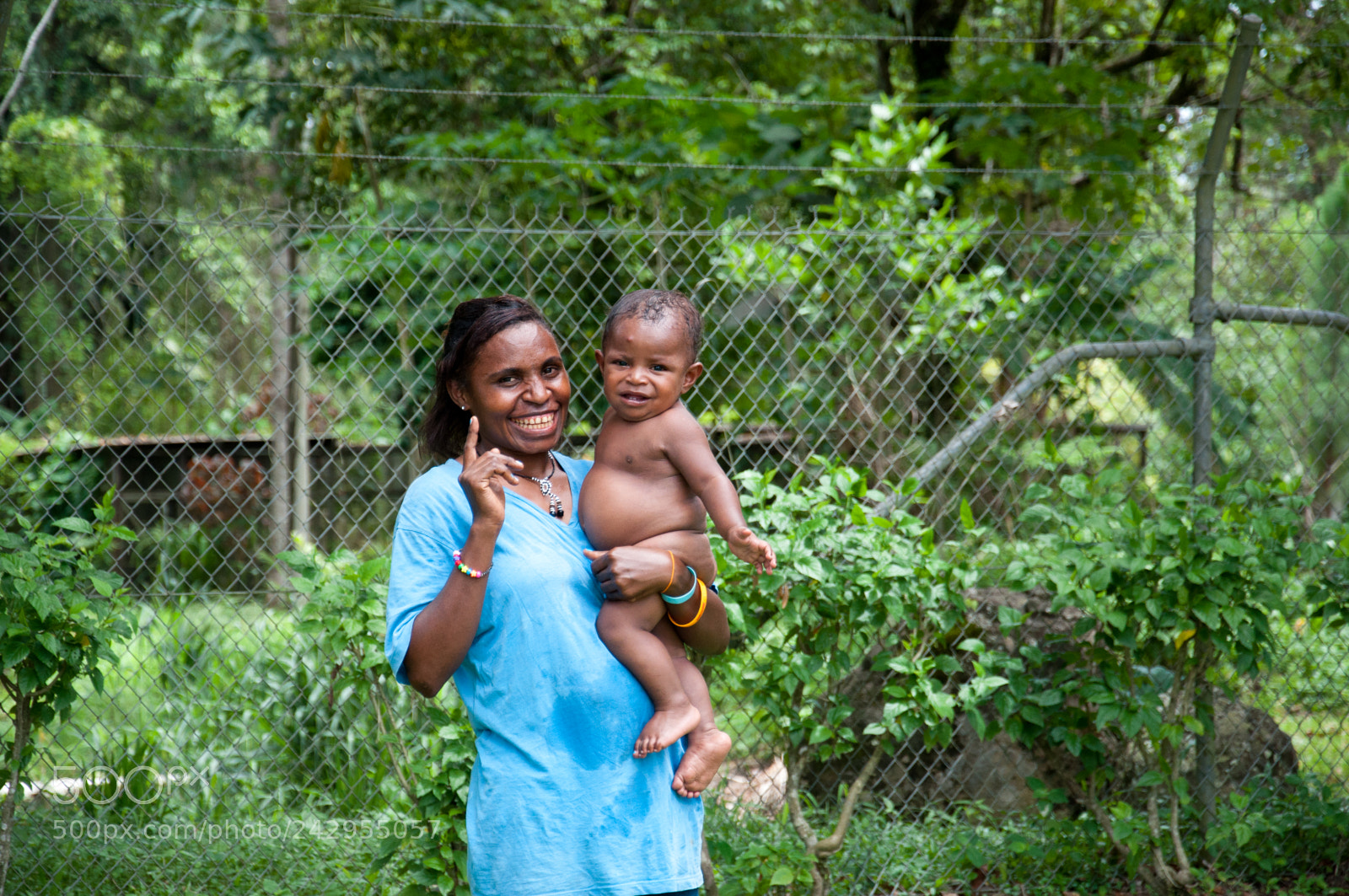 Nikon D5000 sample photo. Papuan mother photography