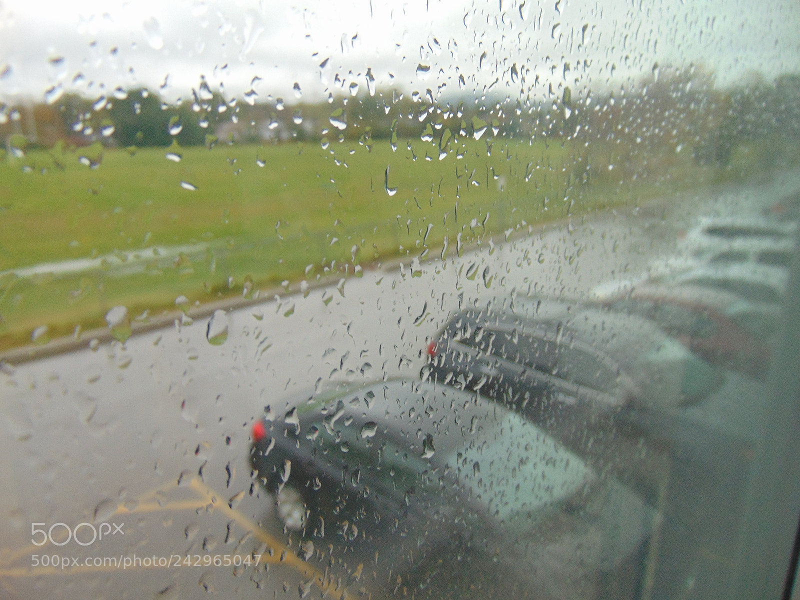 Sony Cyber-shot DSC-H300 sample photo. Rain and cars photography