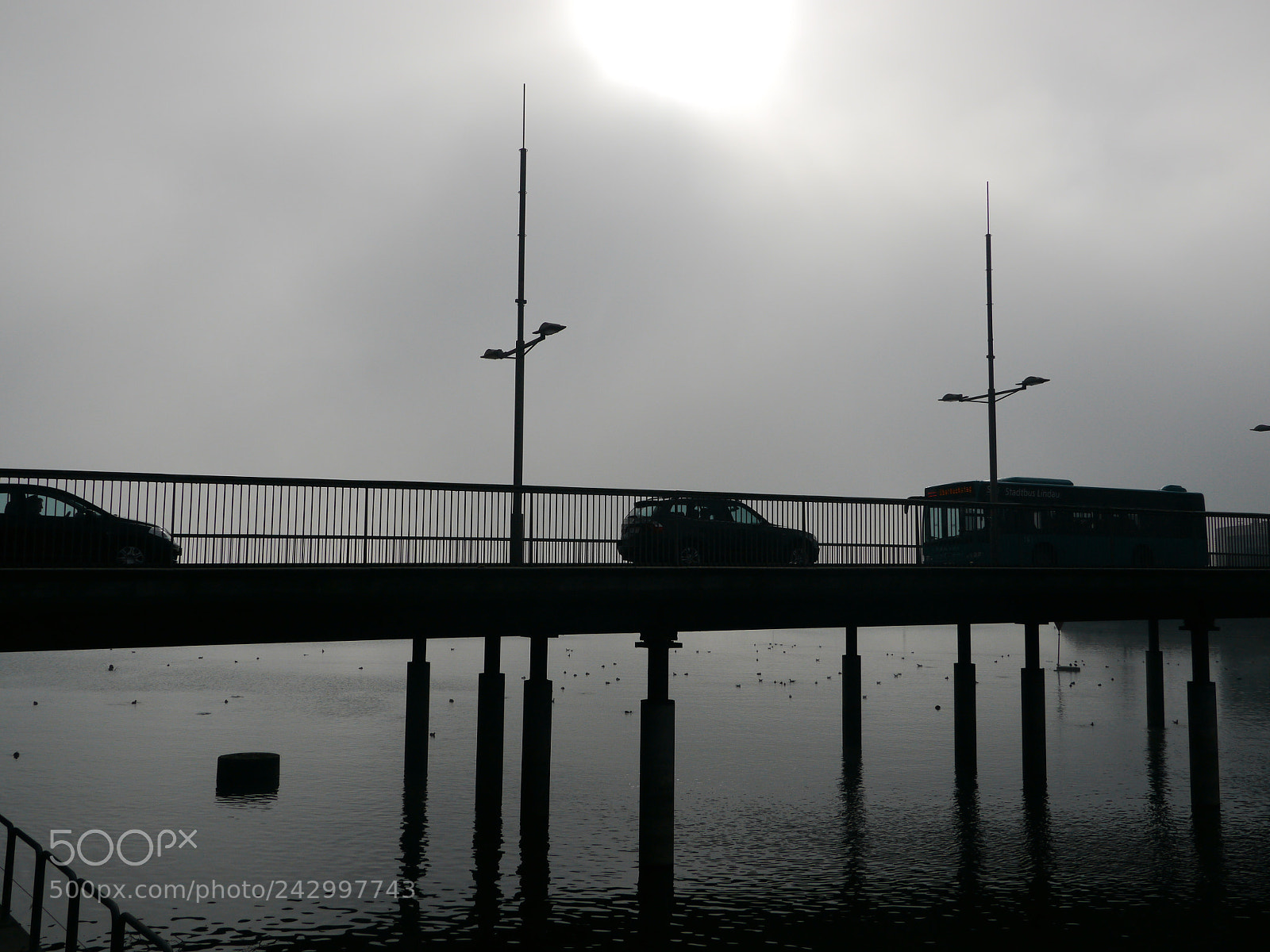 Panasonic Lumix DMC-GH2 sample photo. Bridge silhouettes traffic pedestrians photography