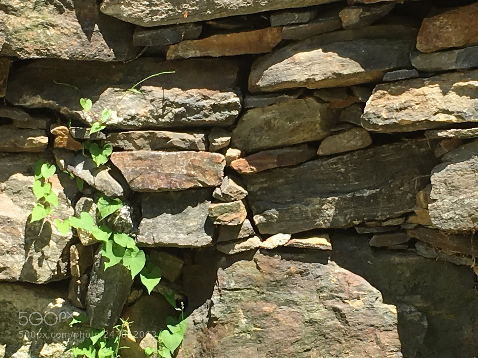 Apple iPhone SE sample photo. Stone and shadow photography