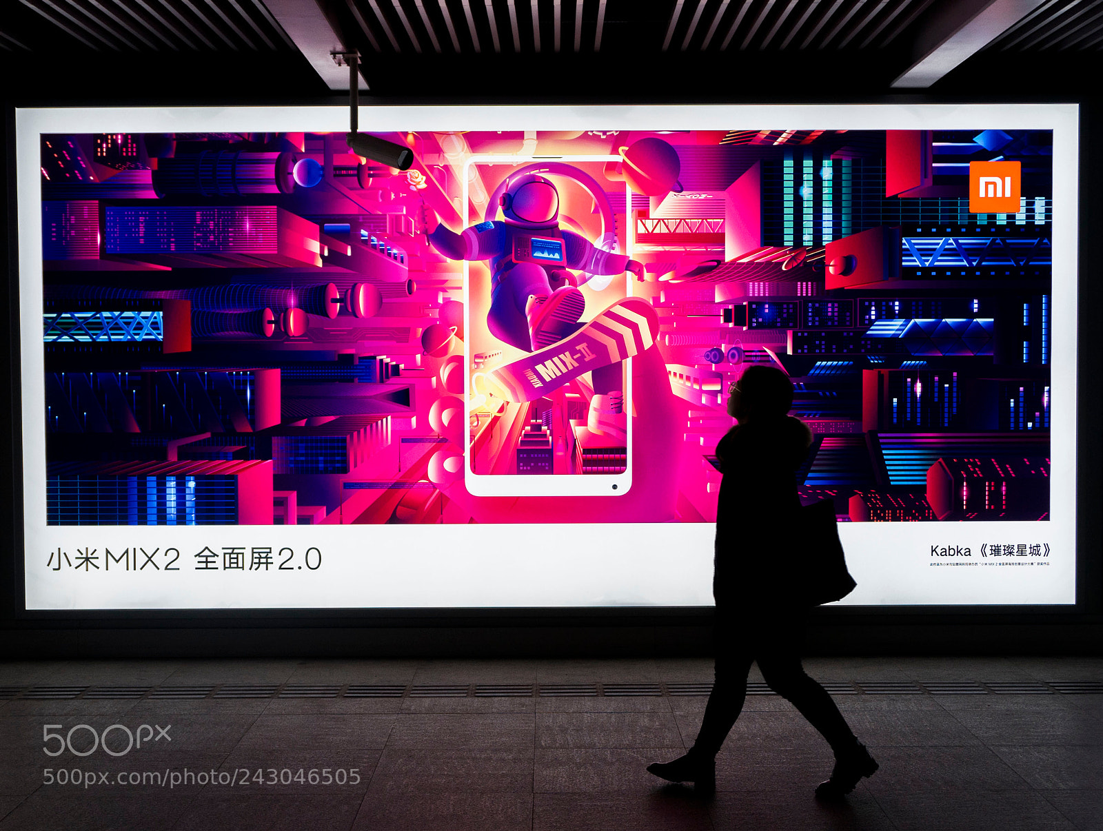 Sony a7 sample photo. Passing by an advertisement photography