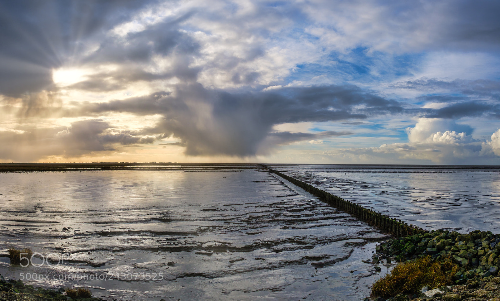 Fujifilm X100F sample photo. Rainshowers crossing waddensea photography