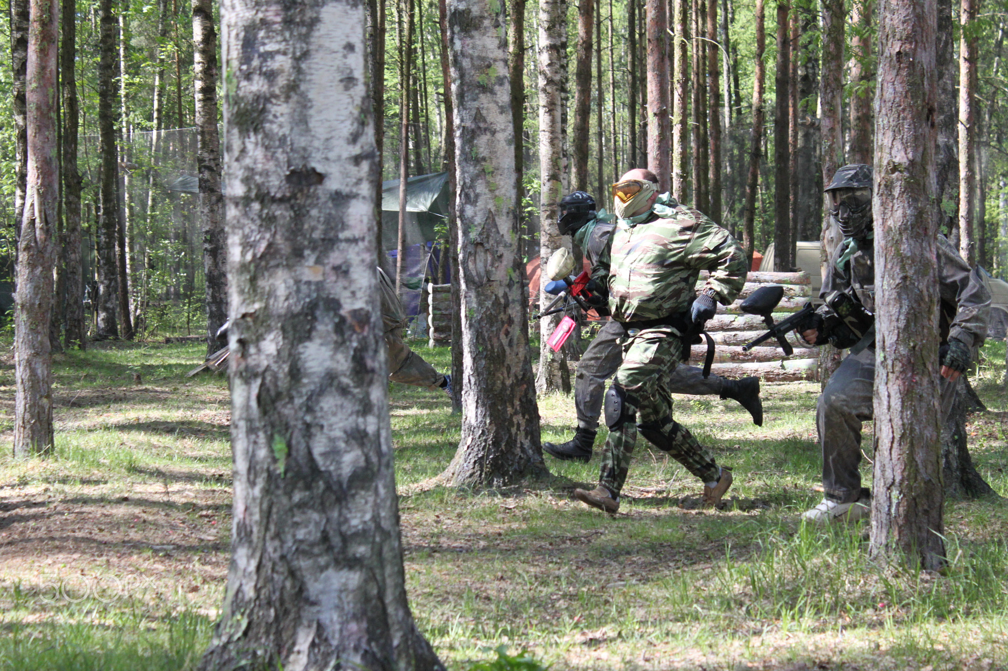 Paintball. Shooting competition of weapons with paint balls.