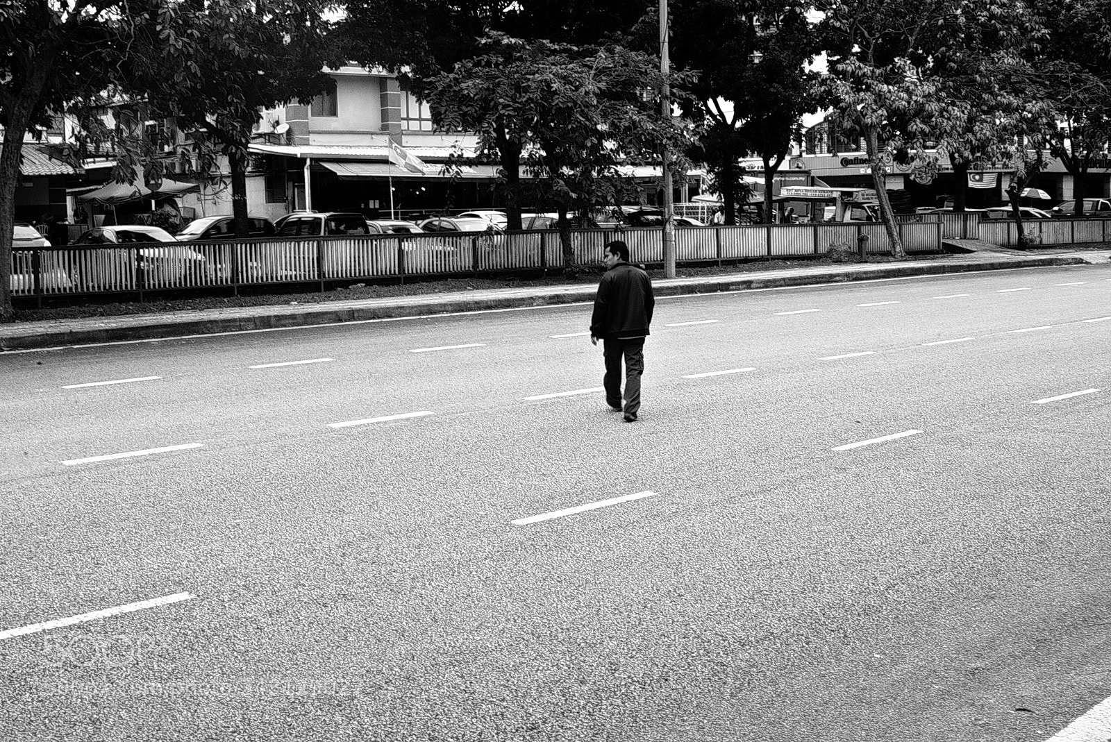 Panasonic Lumix DMC-GF7 sample photo. A lone man is photography
