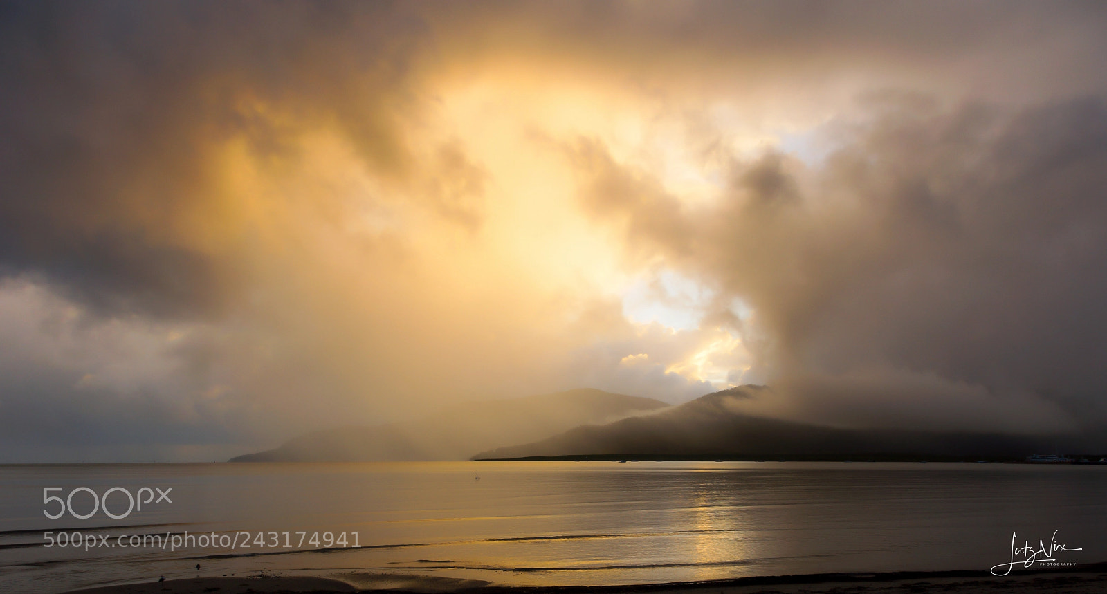 Sony SLT-A65 (SLT-A65V) sample photo. Rain shower in cairns photography