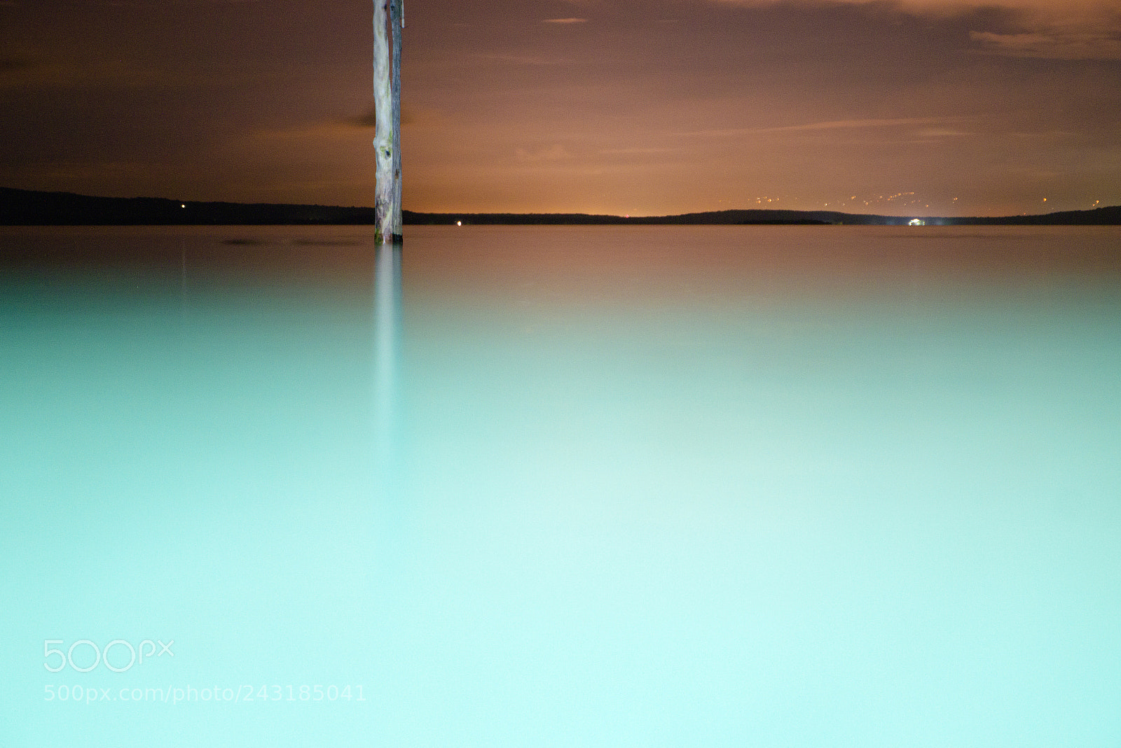 Fujifilm X-T10 sample photo. Smooth sea at night photography