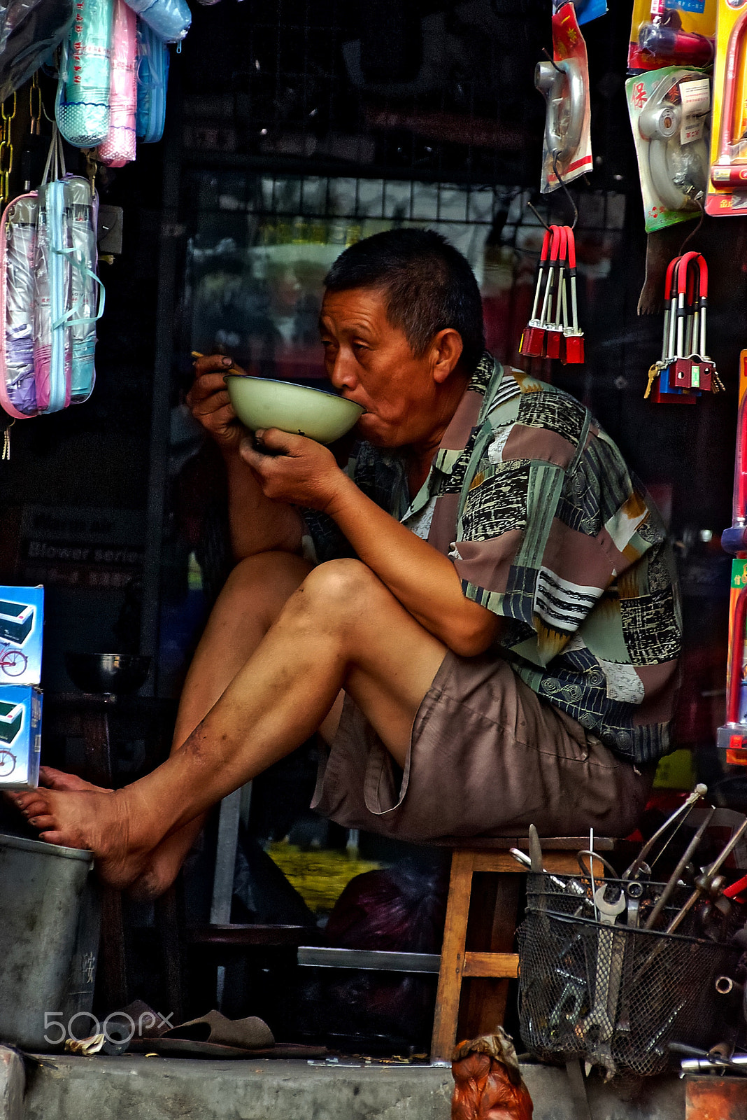 Pentax *ist D sample photo. Shopkeeper in chengdu. photography