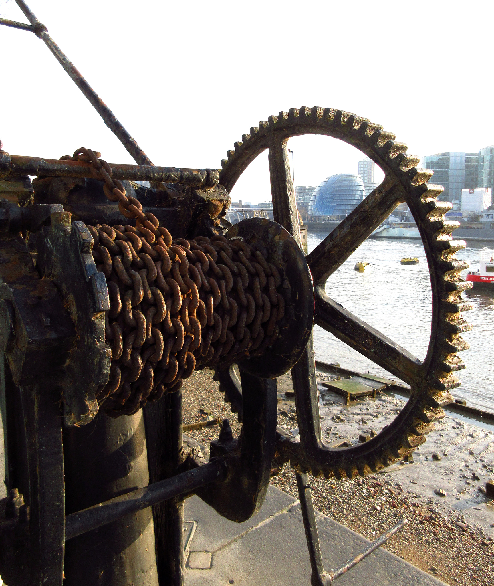 Canon PowerShot ELPH 350 HS (IXUS 275 HS / IXY 640) sample photo. View of city hall, london, through a disused riverside crane photography