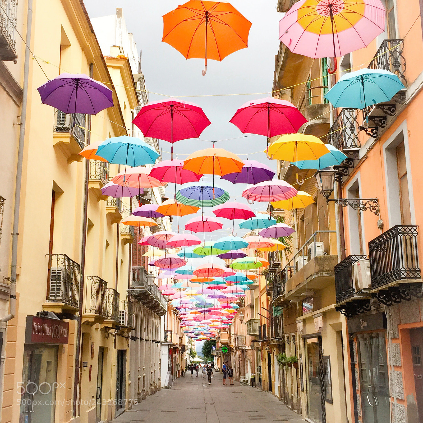 Apple iPhone 6 sample photo. Magic street with umbrellas photography