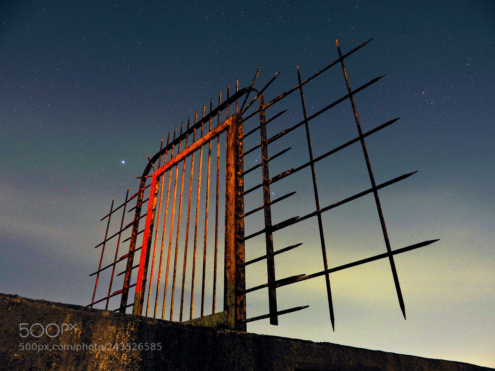Olympus OM-D E-M10 II sample photo. Aggressive iron fence photography