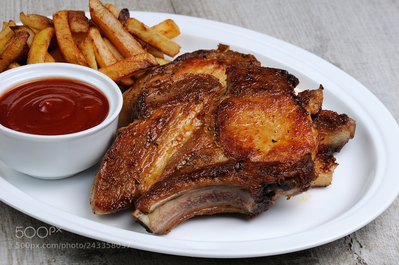 Nikon D90 sample photo. Roasted pork chop steak photography