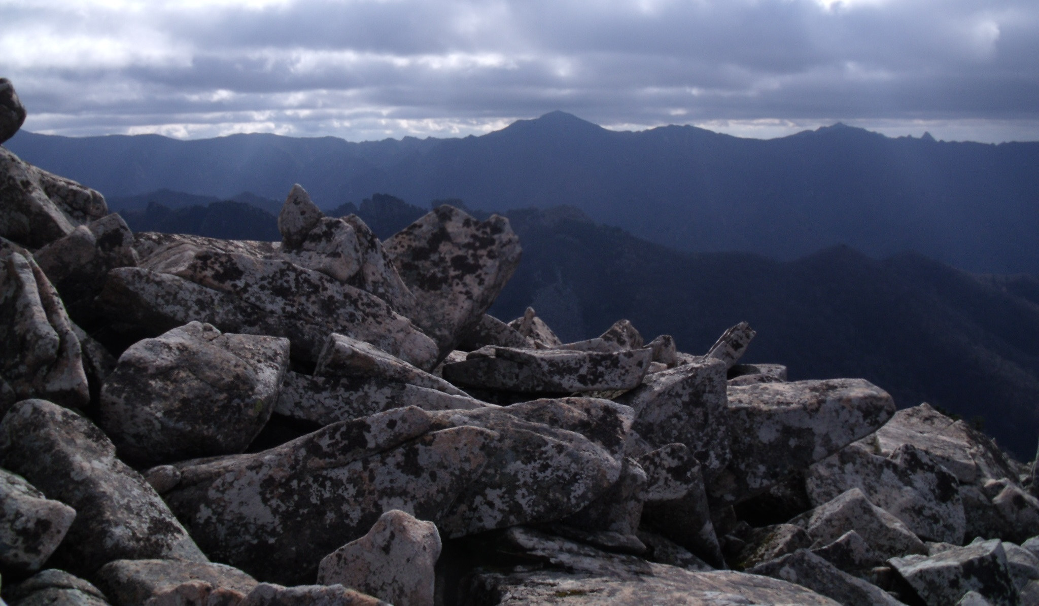 Fujifilm FinePix J110W sample photo. Northwestern ridge under the clouds photography