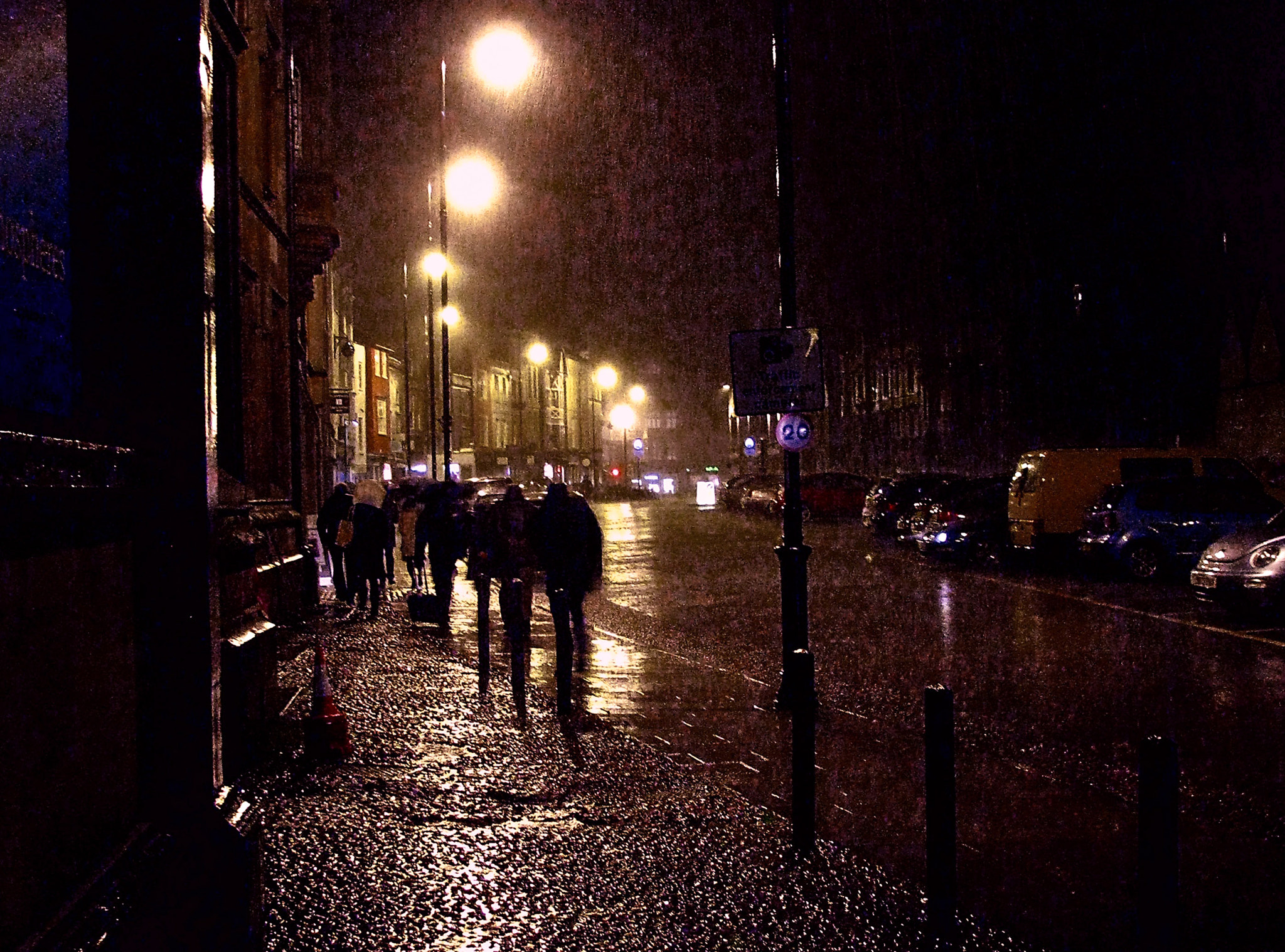 Canon POWERSHOT SX100 IS sample photo. A rainy exit from the sheldonian photography