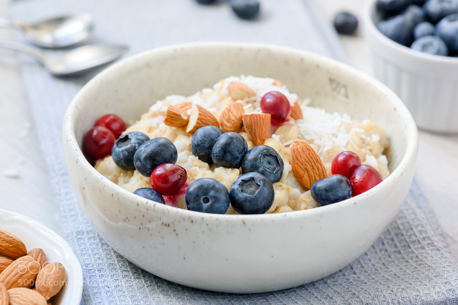 Nikon D810 sample photo. Oatmeal porridge with blueberries photography