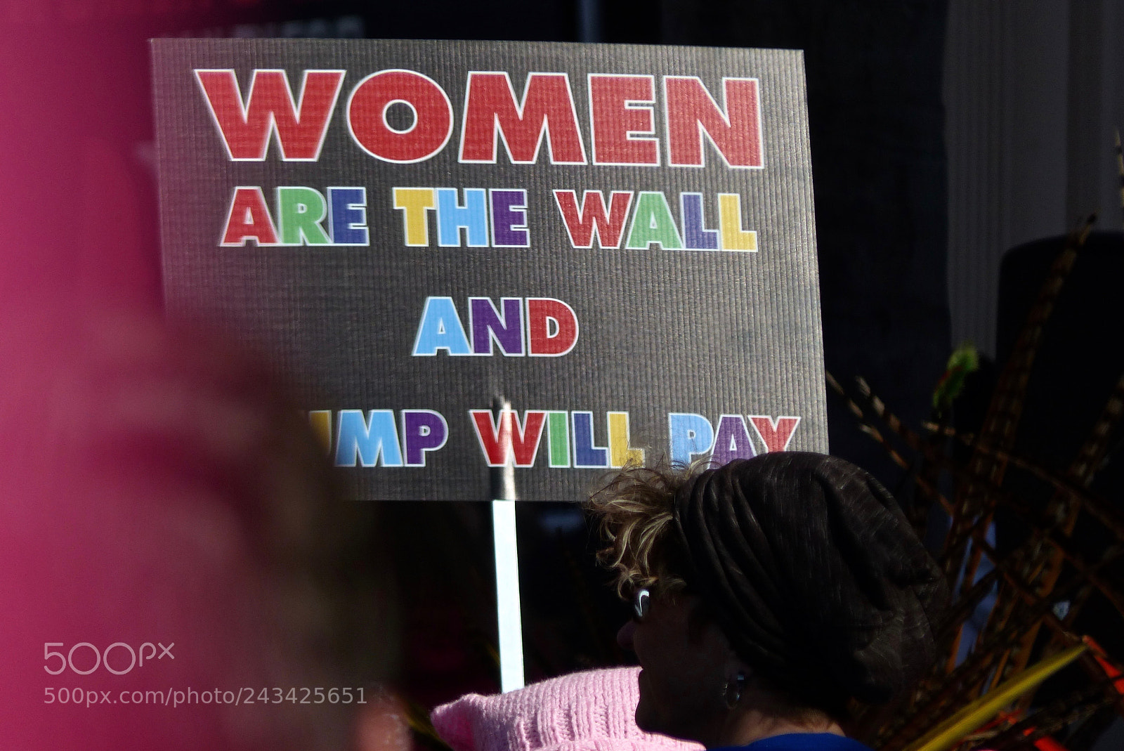 Panasonic Lumix DMC-FZ200 sample photo. Women are the wall photography
