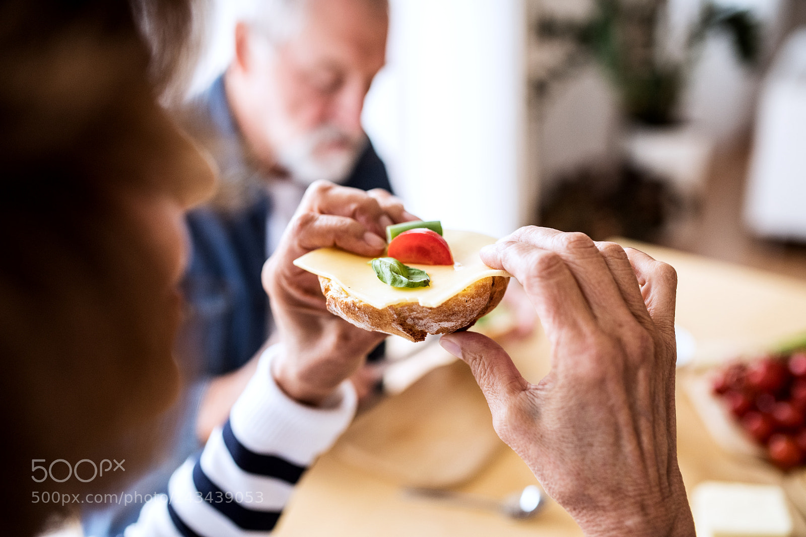 Nikon D5 sample photo. Senior couple eating breakfast photography