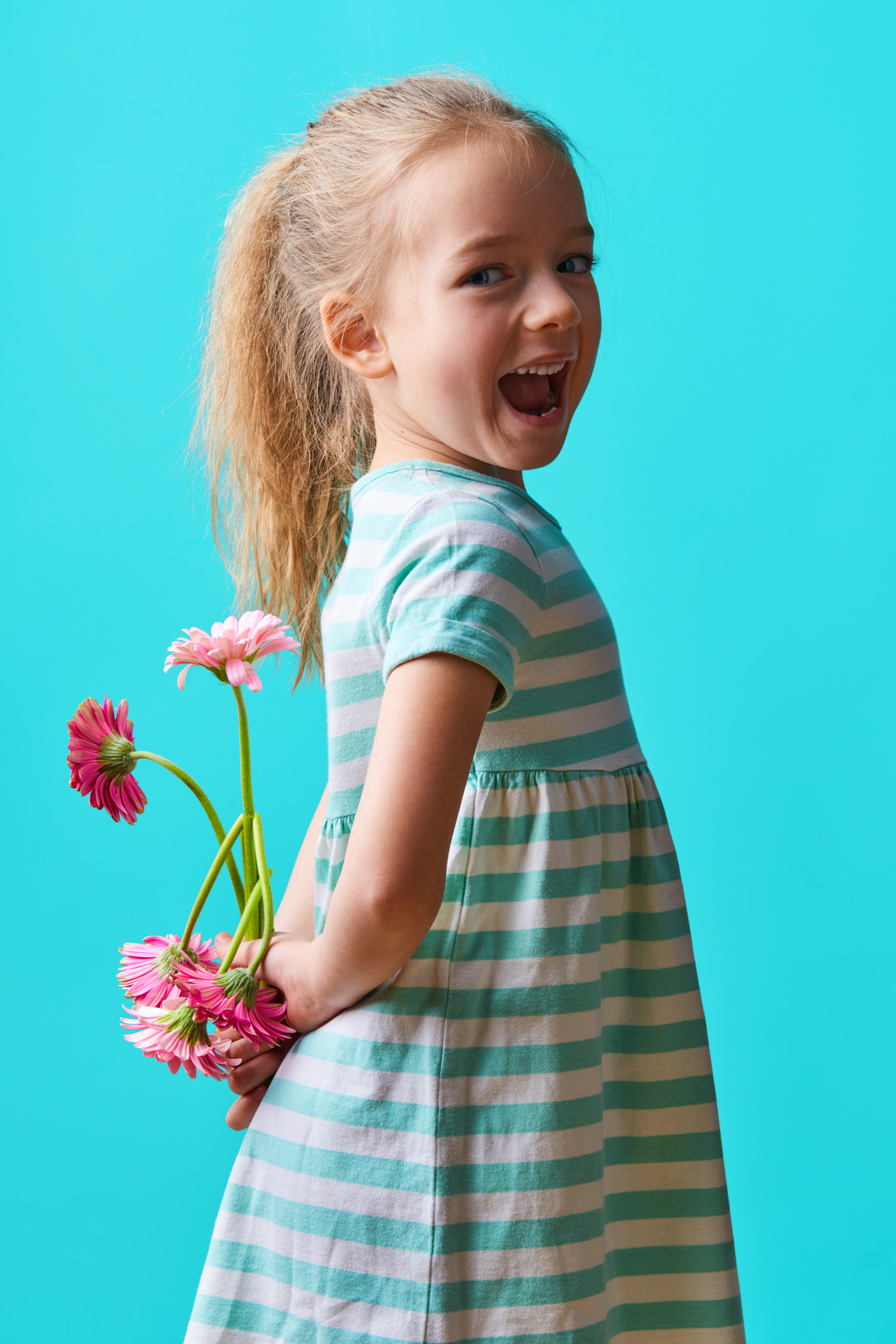 Nikon D810 sample photo. Adorable little girl with cheeky smile and face expression holding bouquet of pink gerbera... photography
