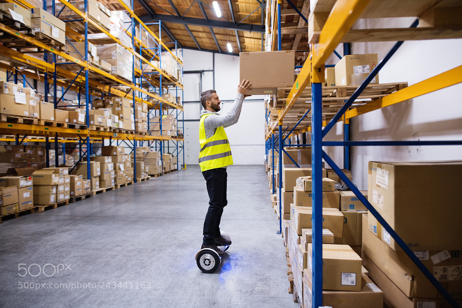 Nikon D5 sample photo. Male warehouse worker on photography