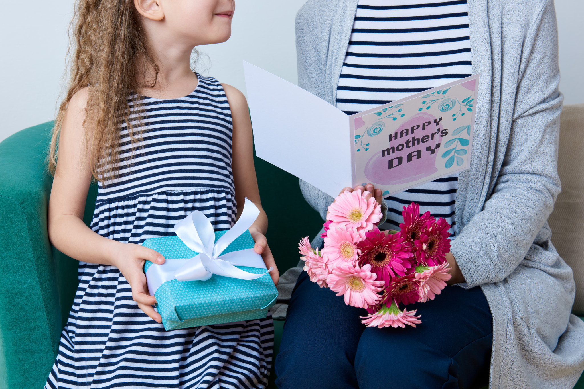 Nikon AF-S Nikkor 24-70mm F2.8G ED sample photo. Happy mother's day. cute little girl giving mom greeting card, present and bouquet of pink... photography