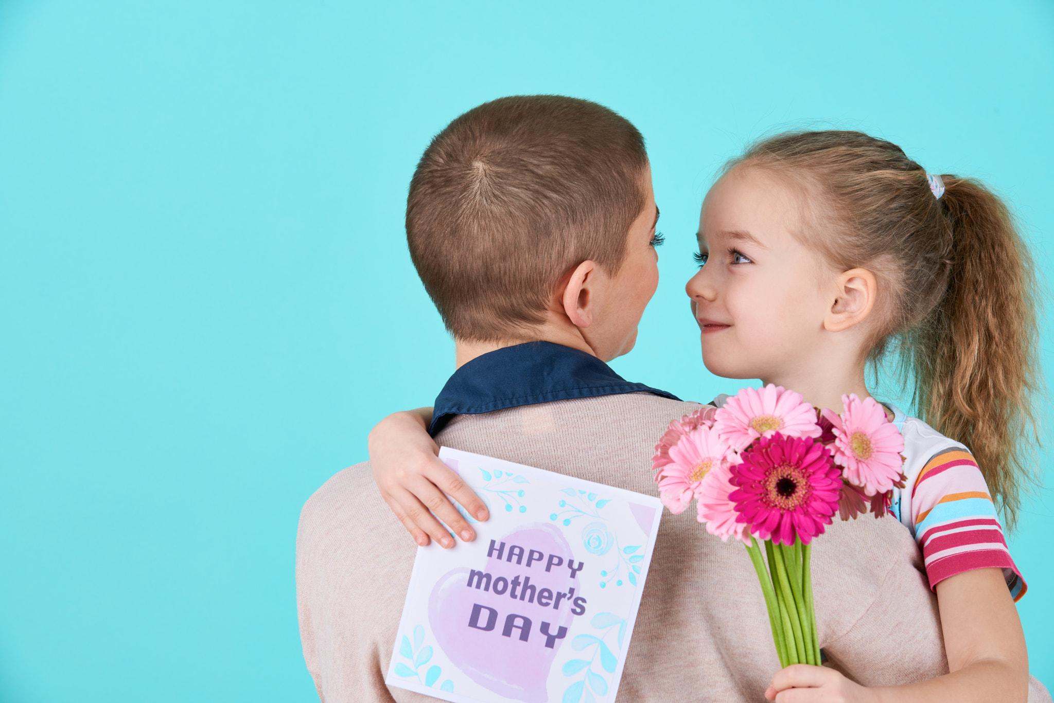 Nikon D810 sample photo. Happy mother's day. cute little girl giving mom mothers day card and bouquet of pink gerbera... photography