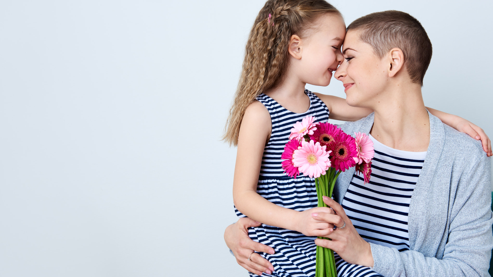 Nikon AF-S Nikkor 24-70mm F2.8G ED sample photo. Happy mother's day, women's day or birthday background. cute little girl giving mom bouquet of... photography