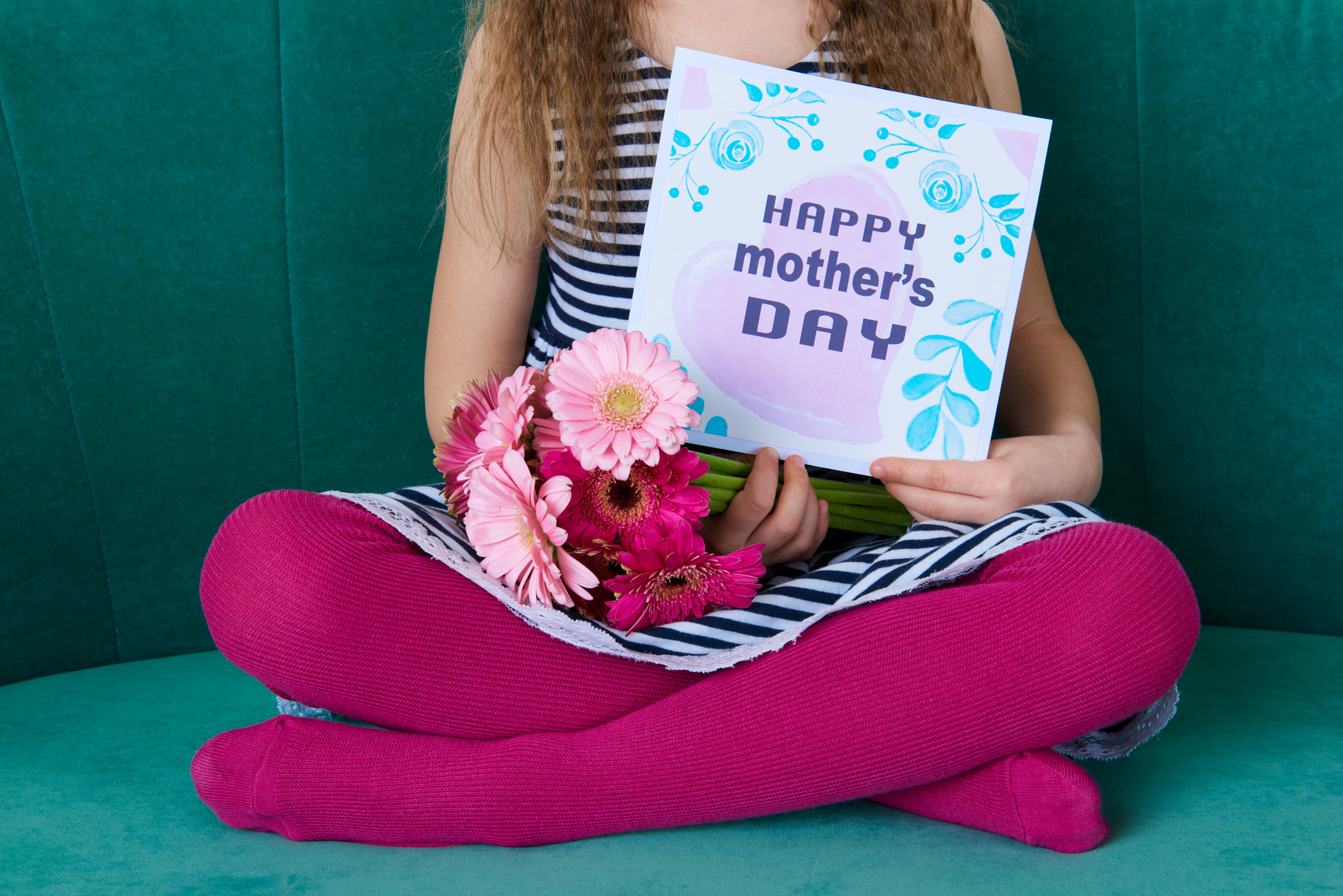 Nikon AF-S Nikkor 24-70mm F2.8G ED sample photo. Unrecognisable young girl sitting on a couch, holding bouquet of pink gerbera daisies and... photography