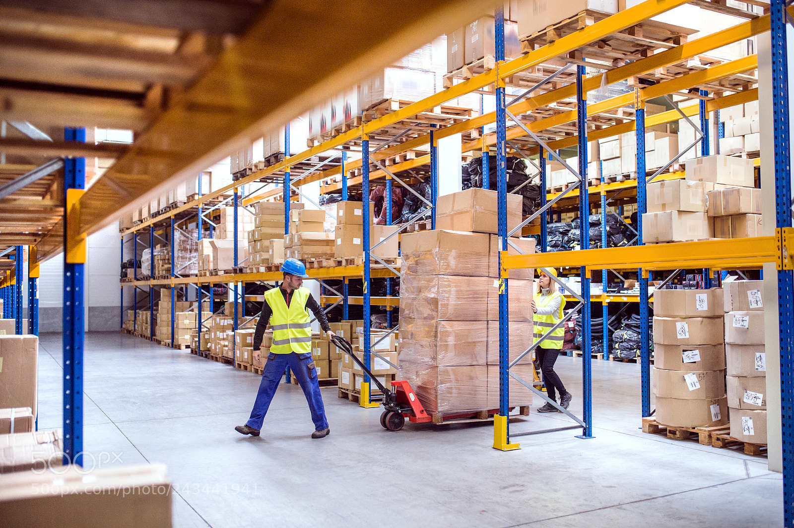 Nikon D4S sample photo. Warehouse workers pulling a photography