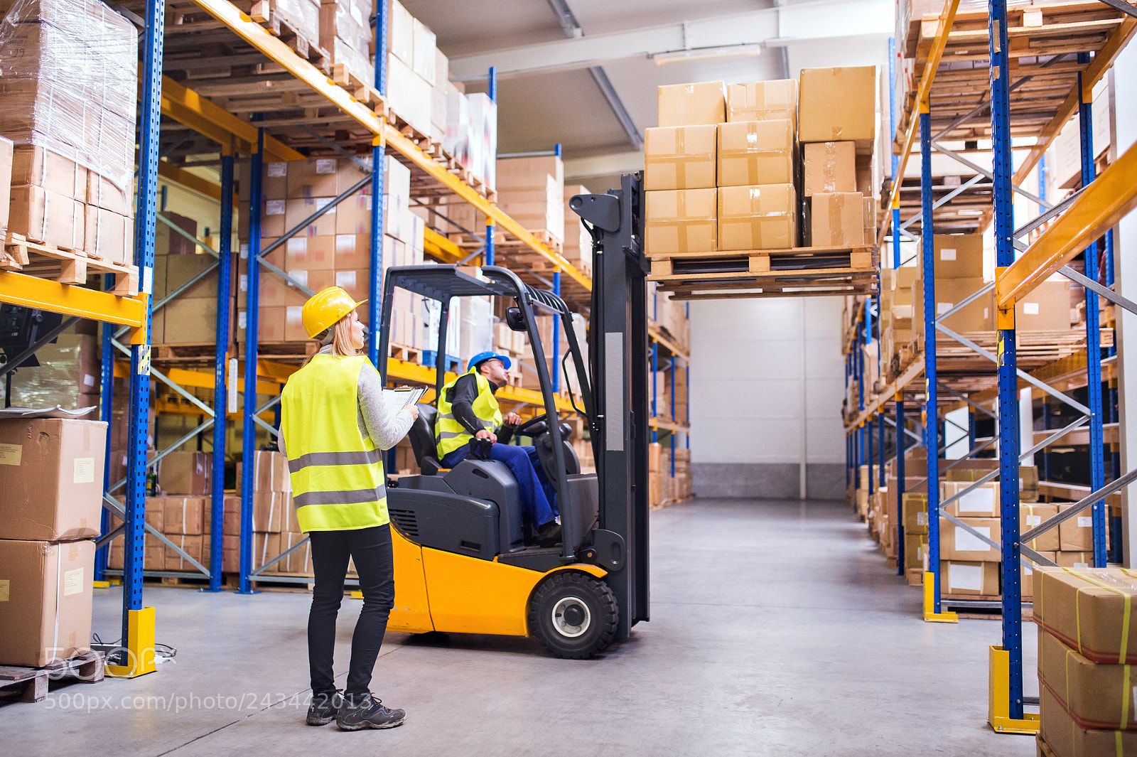 Nikon D4S sample photo. Young warehouse workers working photography