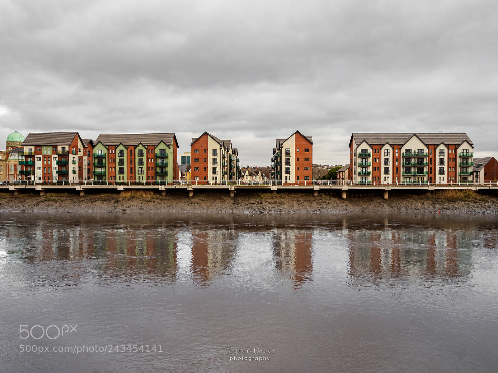 Olympus OM-D E-M10 II sample photo. Riverfront houses photography