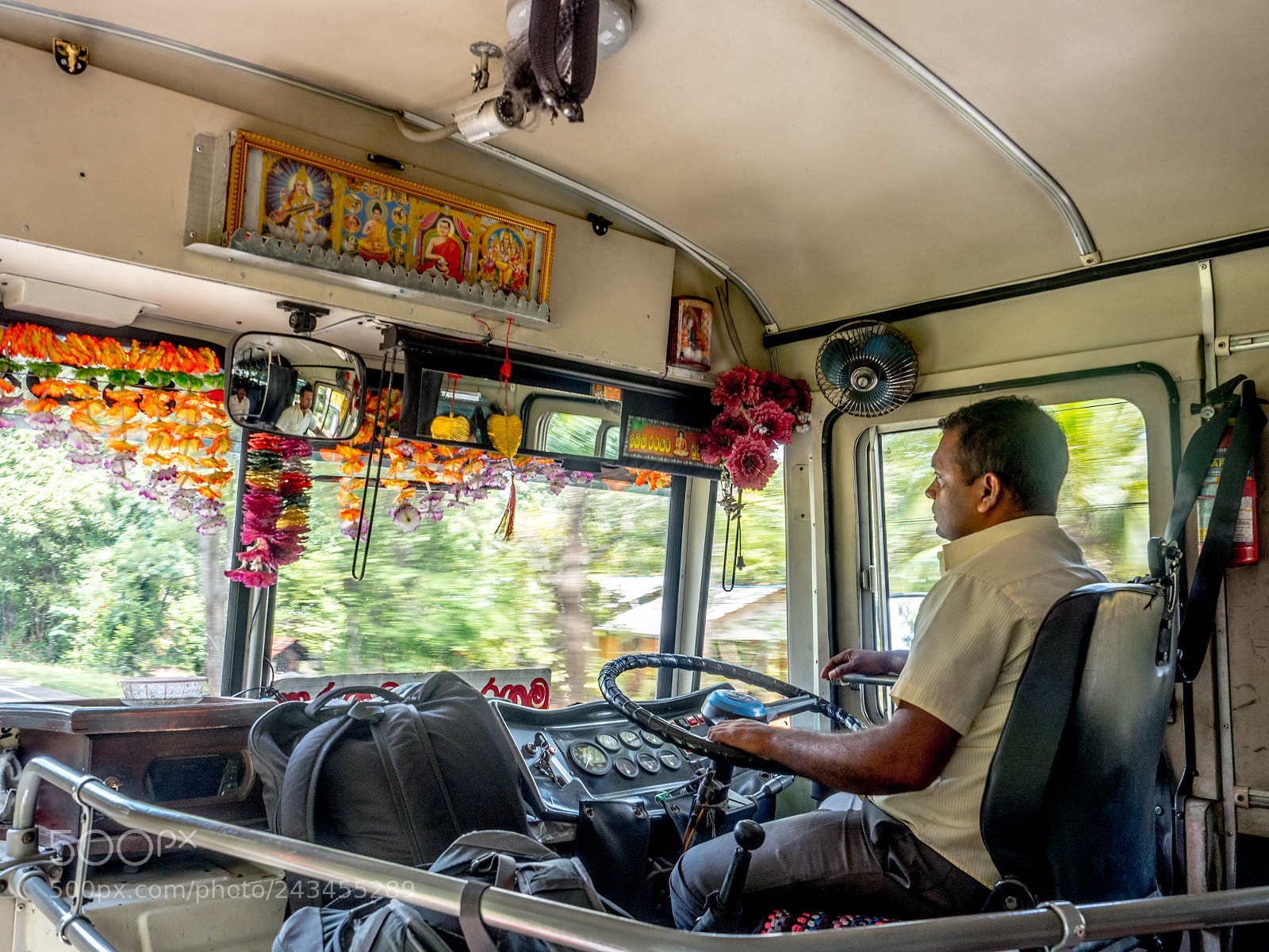 Olympus OM-D E-M5 II sample photo. Bus driver speeding through photography