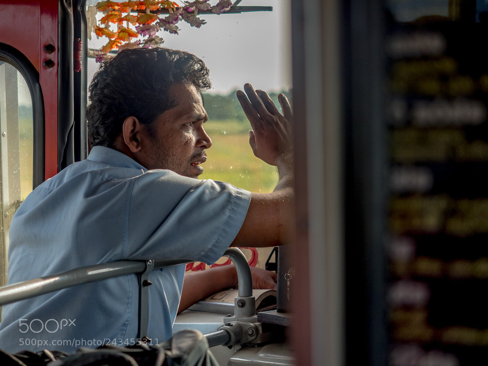 Olympus OM-D E-M5 II sample photo. Concerned ticket inspector on photography