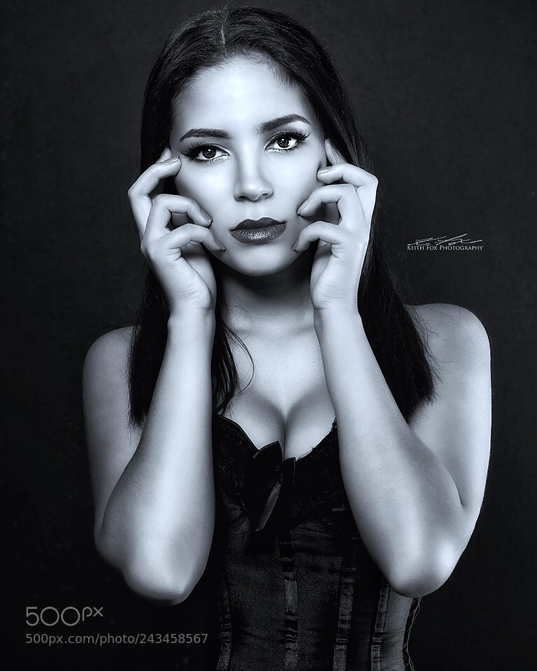 Nikon D610 sample photo. The face is a photography