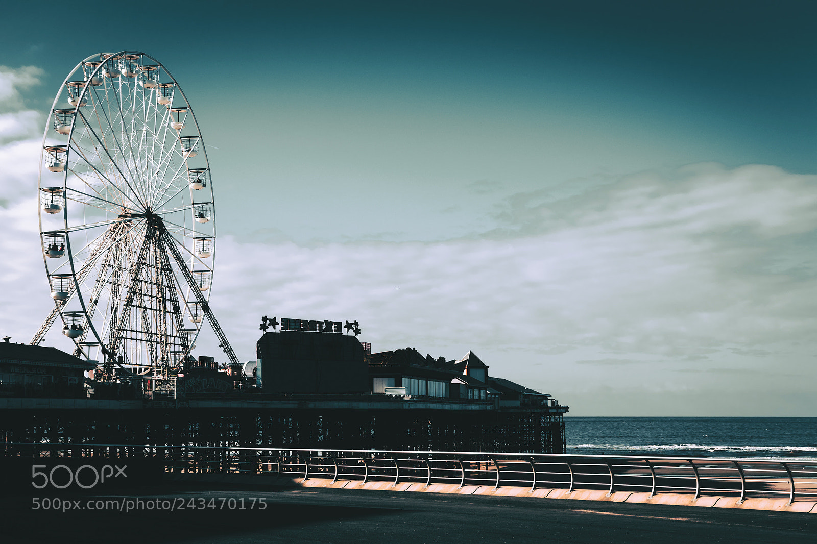 Nikon D5500 sample photo. Wheel on the pier photography