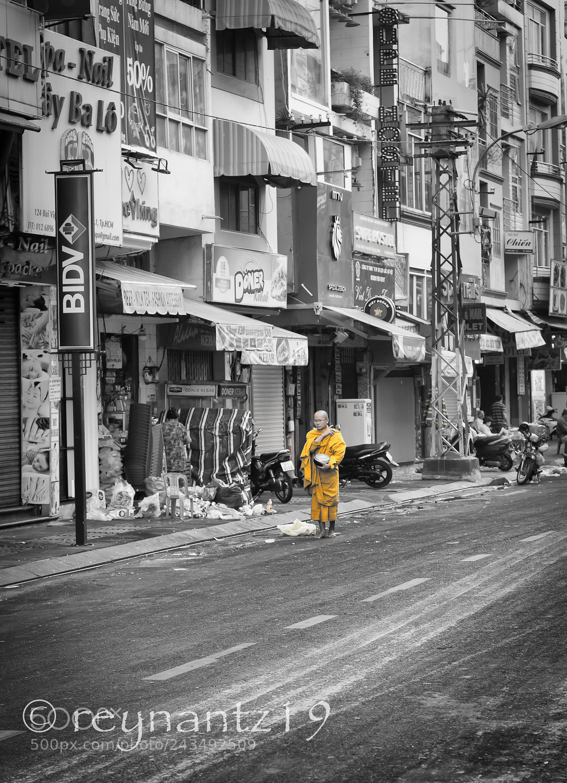 Canon EOS 60D sample photo. A praying monk on photography