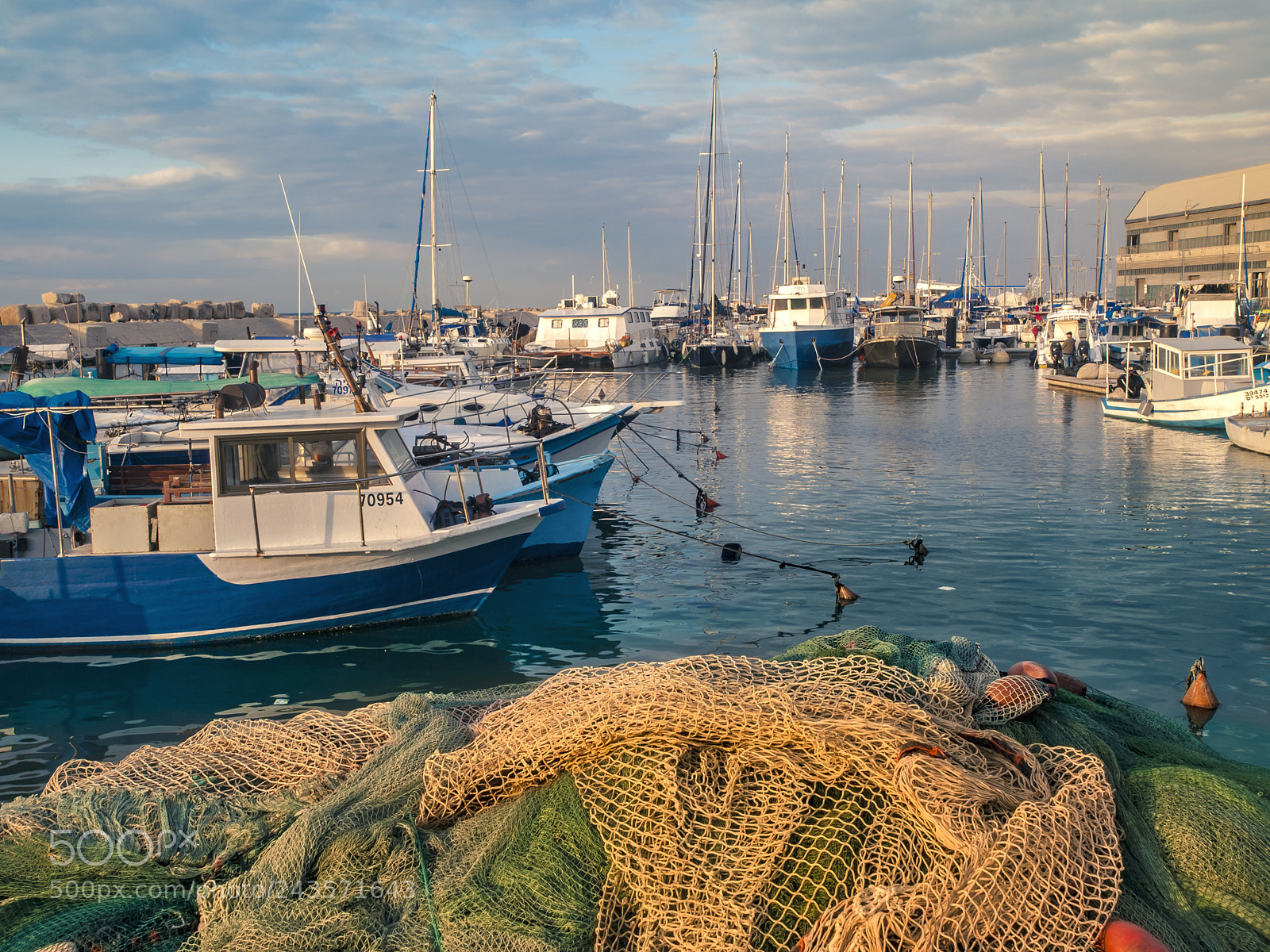 Olympus E-3 sample photo. Sunlight in fishing nets. photography