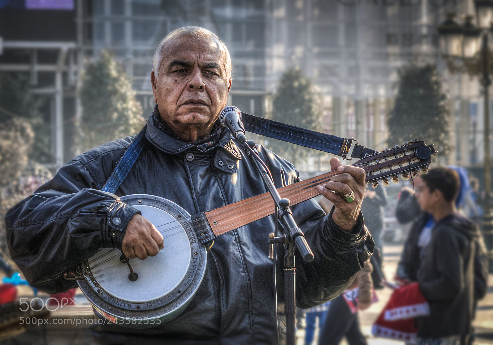 Nikon D5000 sample photo. Street musician photography