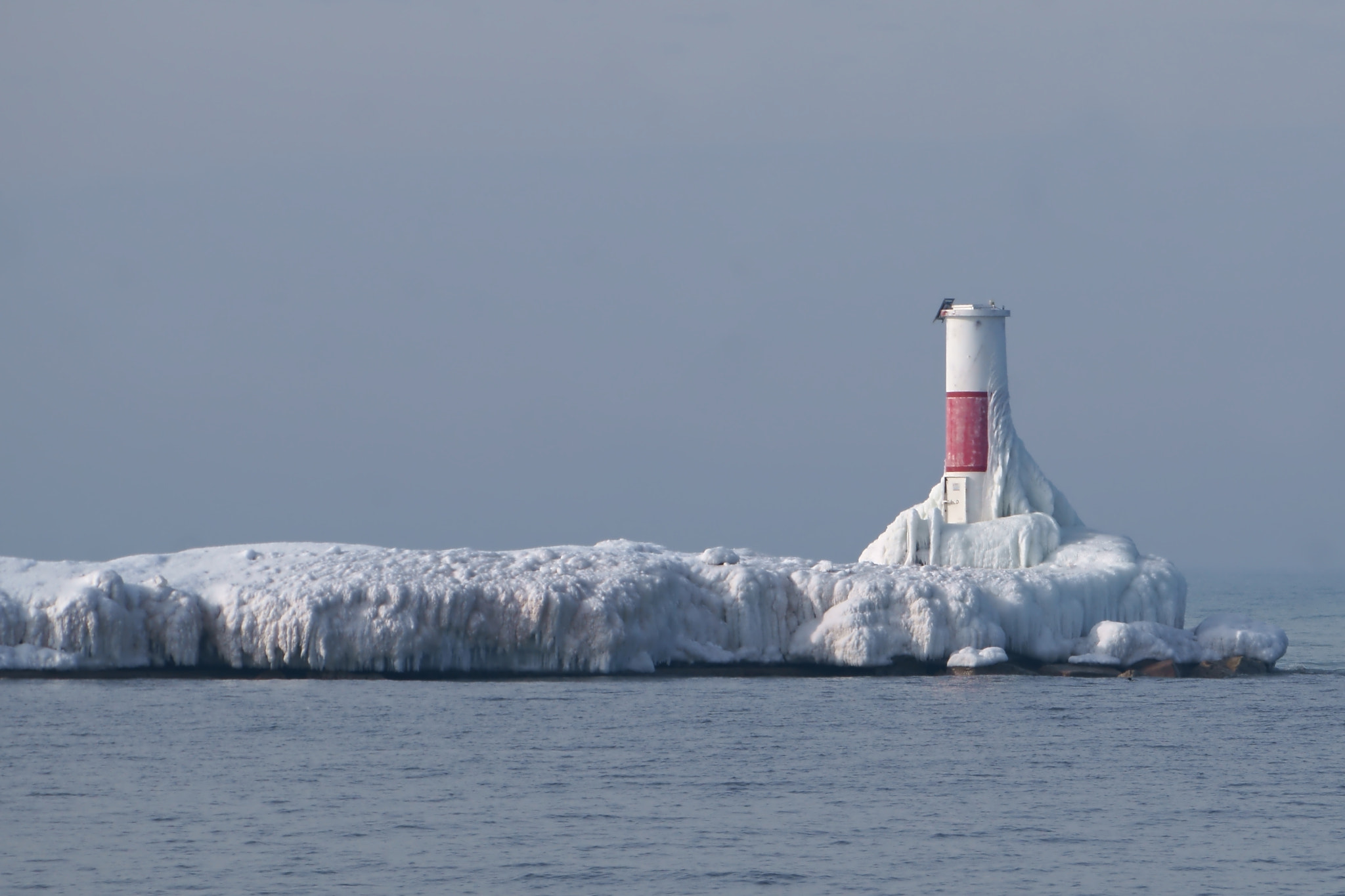 Sony Alpha a3000 + Sony E 55-210mm F4.5-6.3 OSS sample photo. Cold lighthouse photography