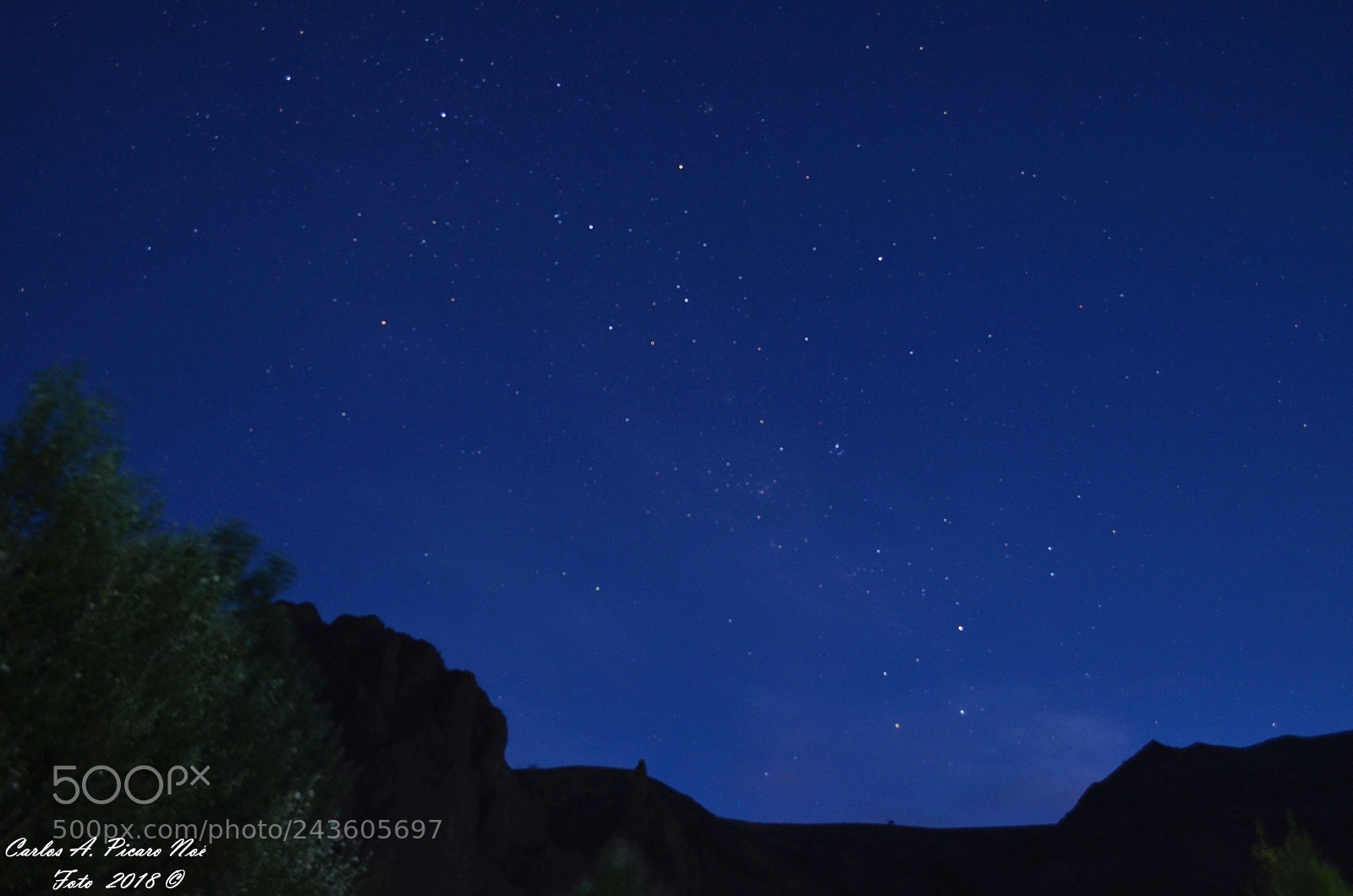 Nikon D5100 sample photo. Woman looking the night photography
