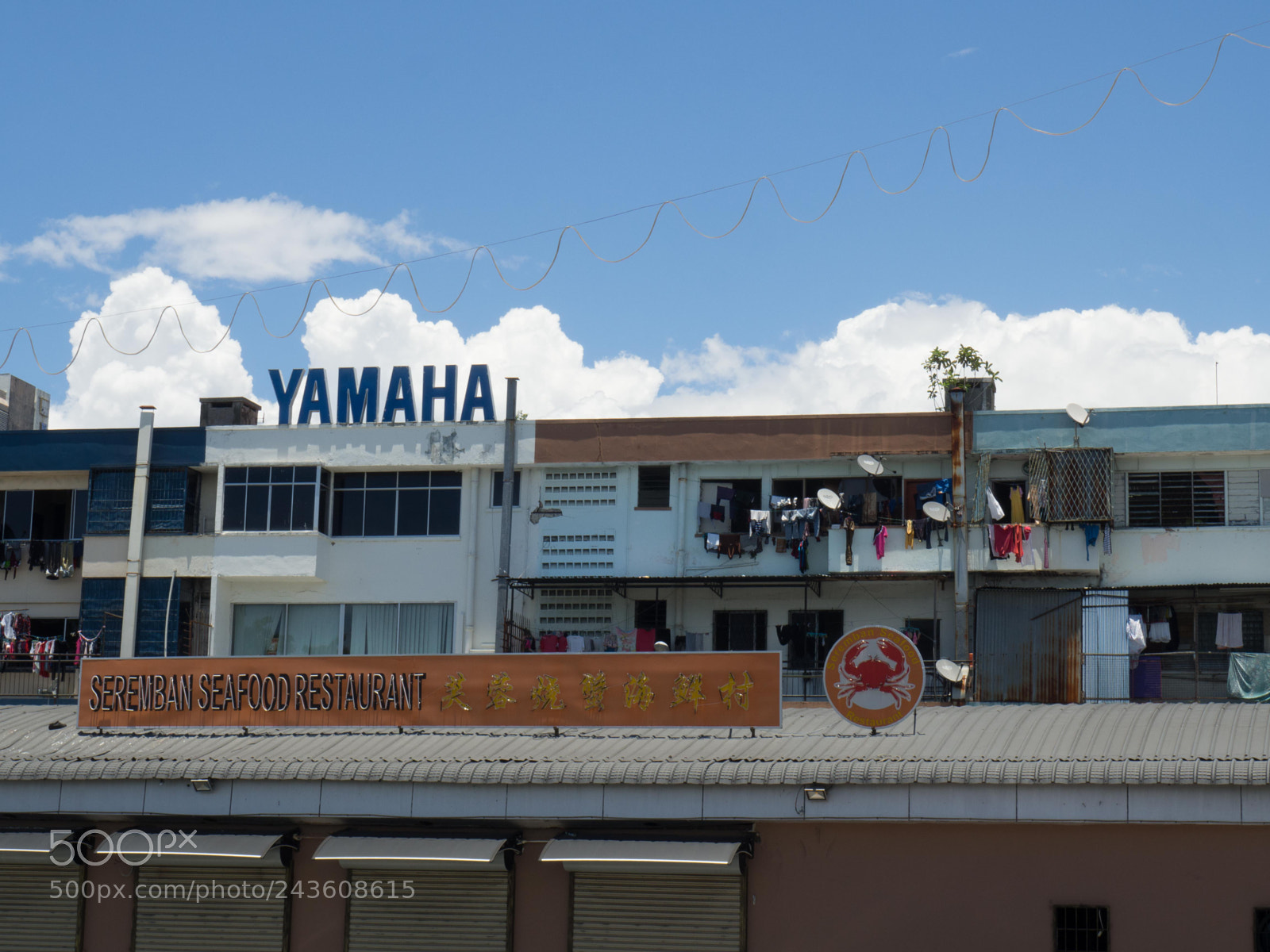 Olympus OM-D E-M10 sample photo. Urban scene in kotakinabalu photography
