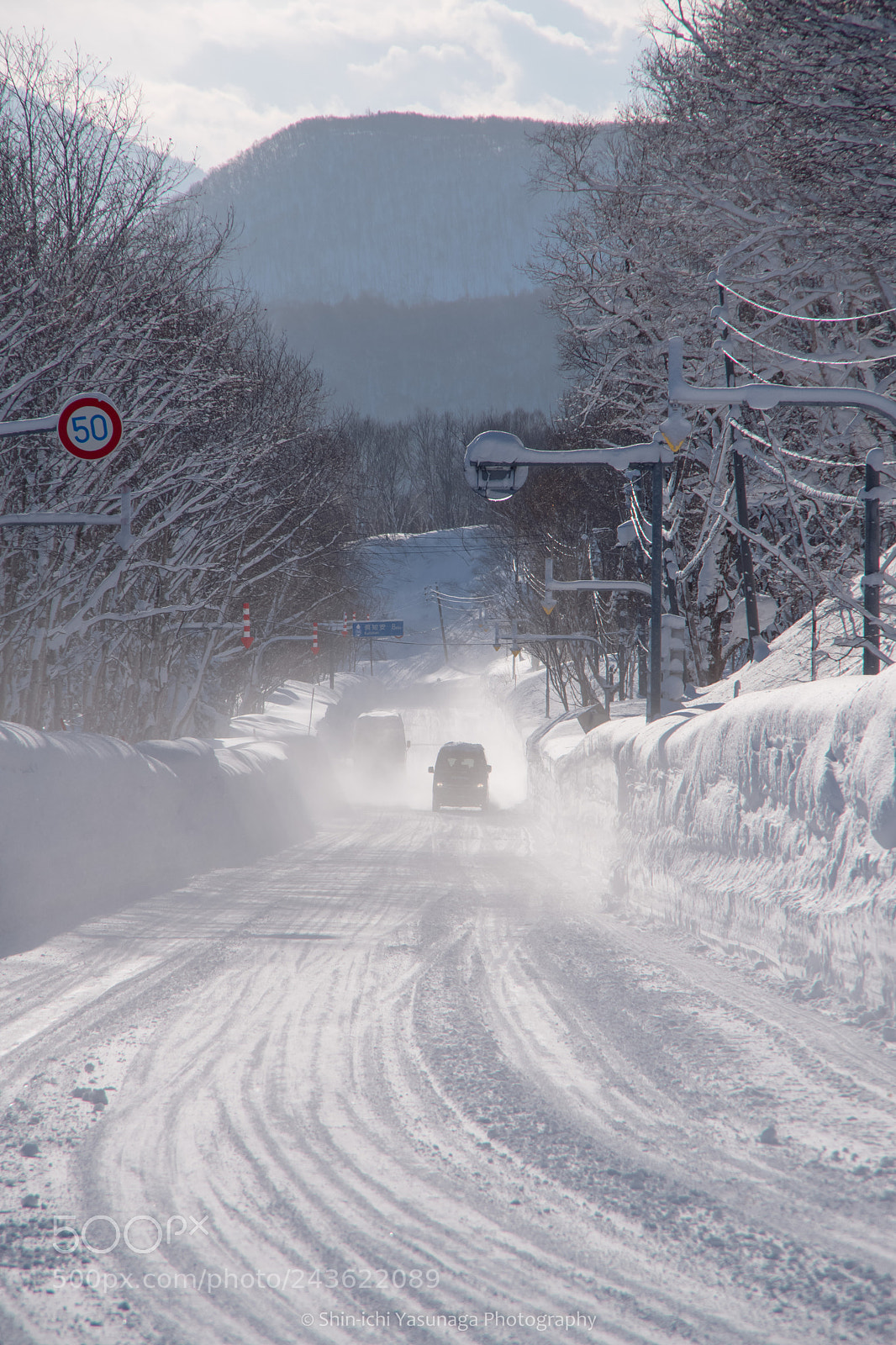 Pentax K-70 sample photo. Passing cars in winter. photography