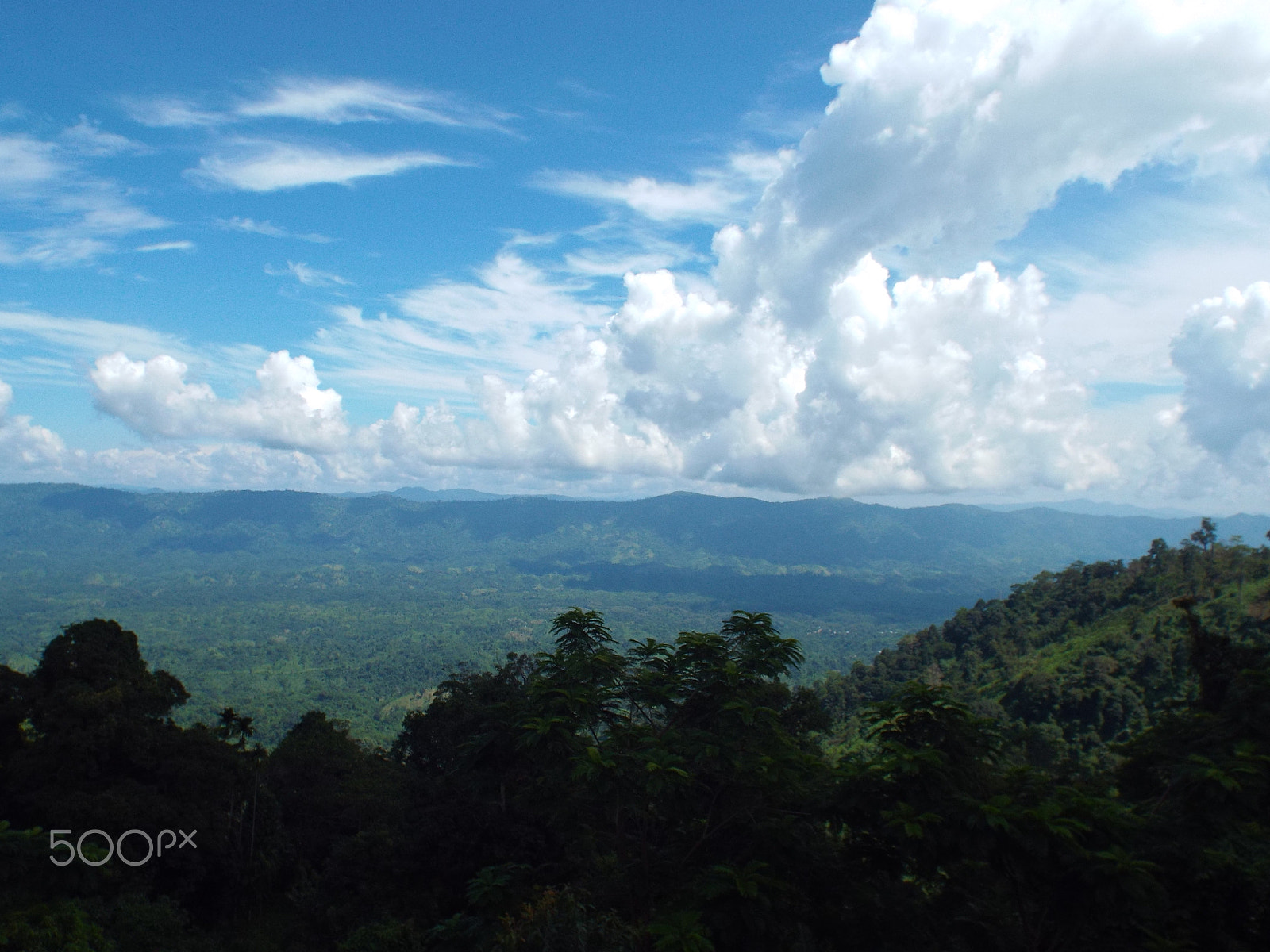 Fujifilm FinePix S6800 sample photo. Blue sky white clouds photography