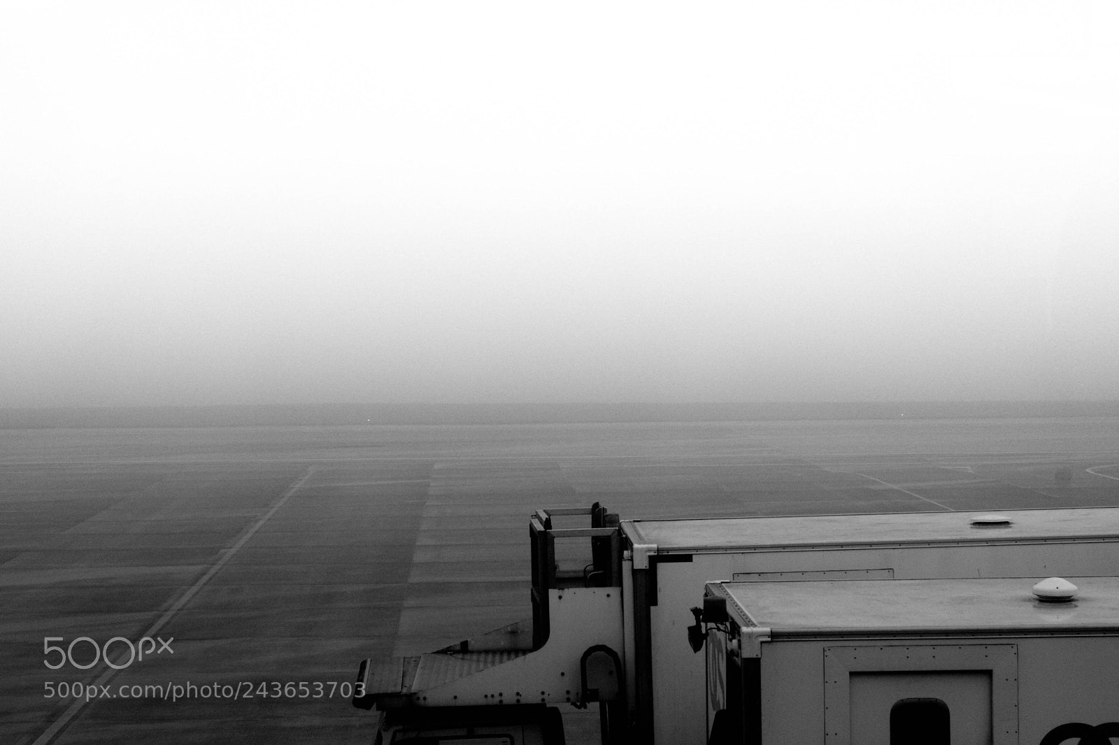 Canon EOS 1000D (EOS Digital Rebel XS / EOS Kiss F) sample photo. Misty airport photography