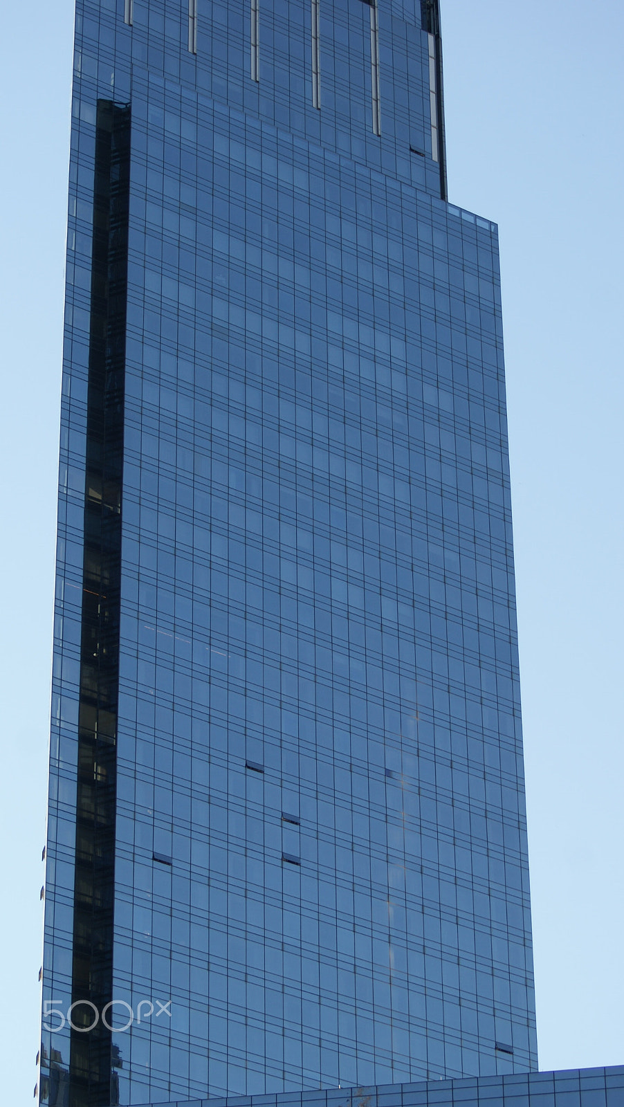 Sony 75-300mm F4.5-5.6 sample photo. Blue skyscraper. photography