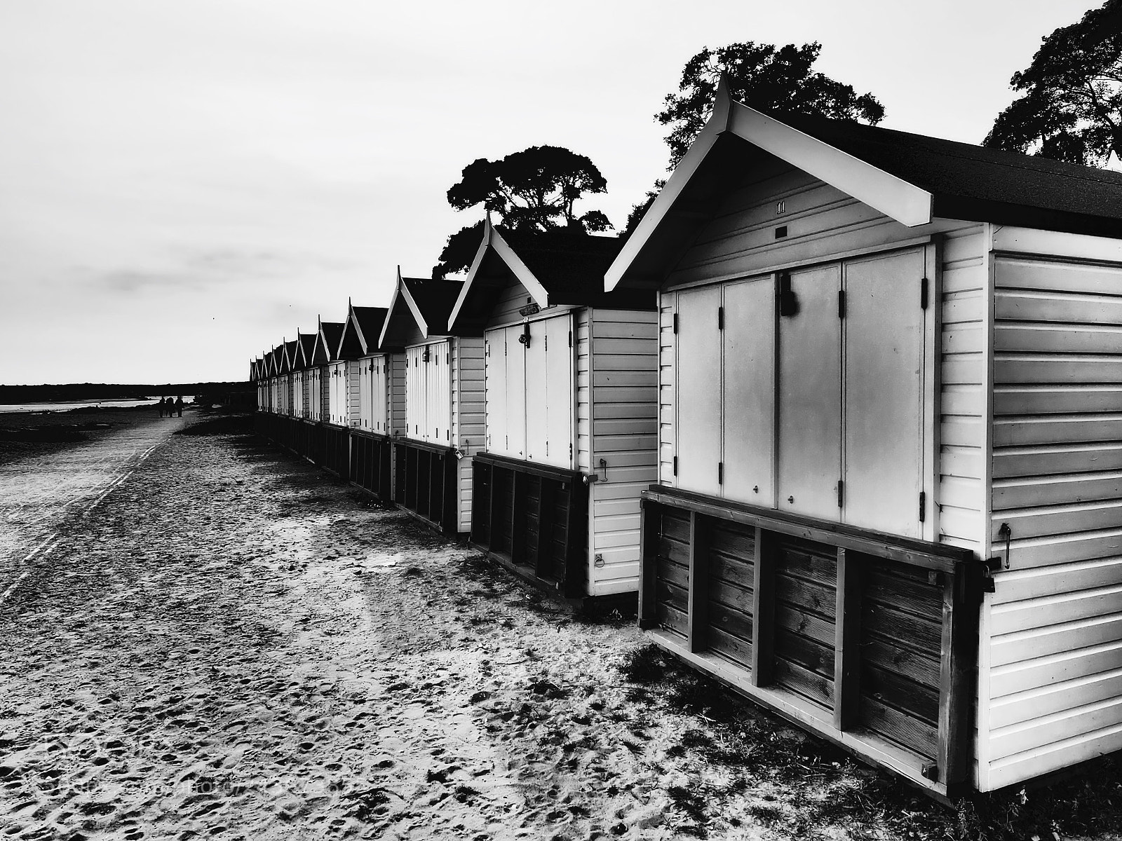Olympus OM-D E-M5 II sample photo. Huts, b&w photography