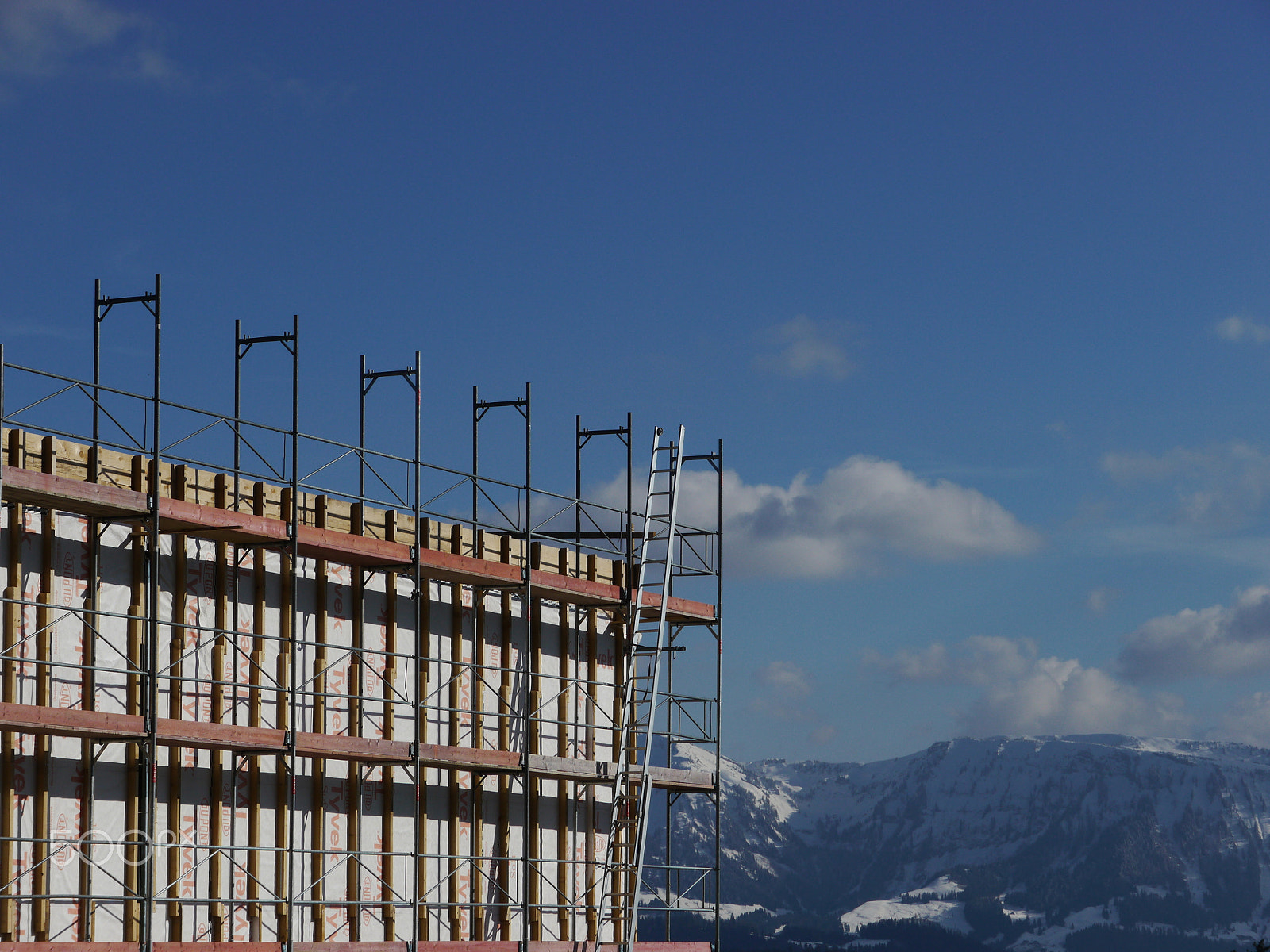 Panasonic Lumix DMC-GH2 sample photo. Scaffold of a construction area photography