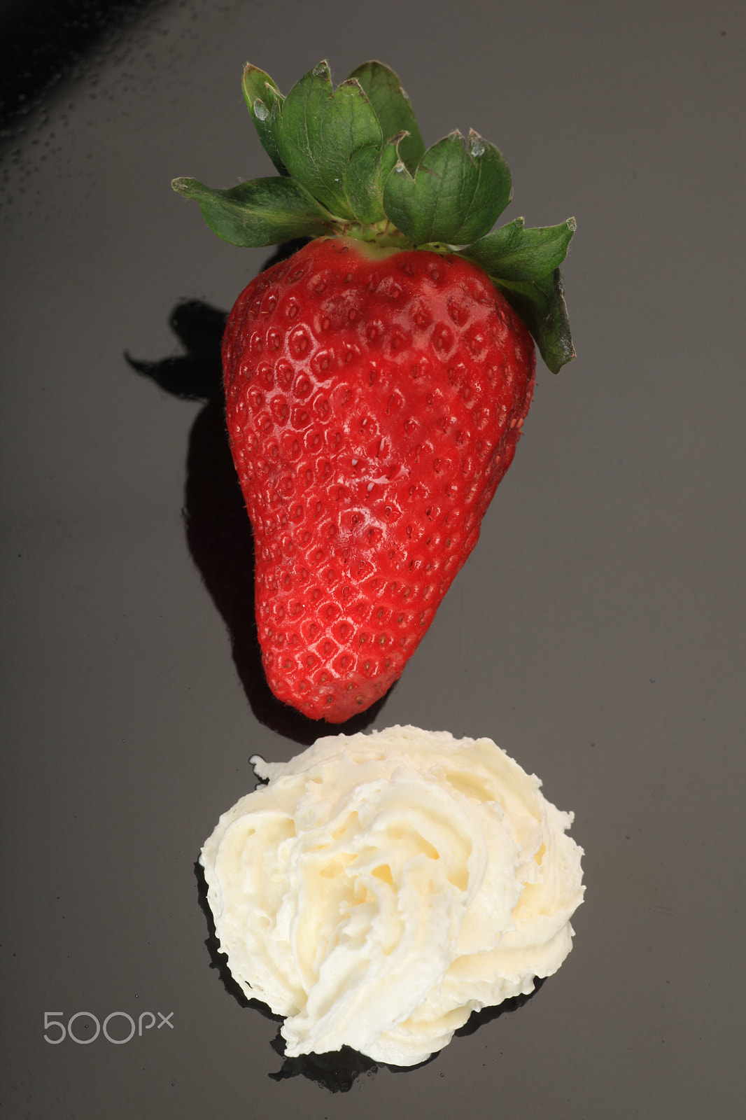 Canon EF 70-300mm F4-5.6 IS USM sample photo. Some white delicious cream with red strawberry photography