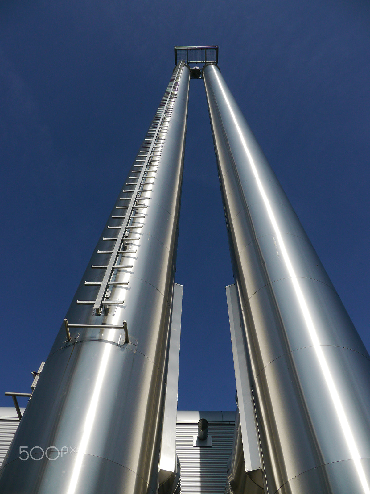 Panasonic Lumix DMC-GH2 sample photo. Lot of grey steel pipes photography