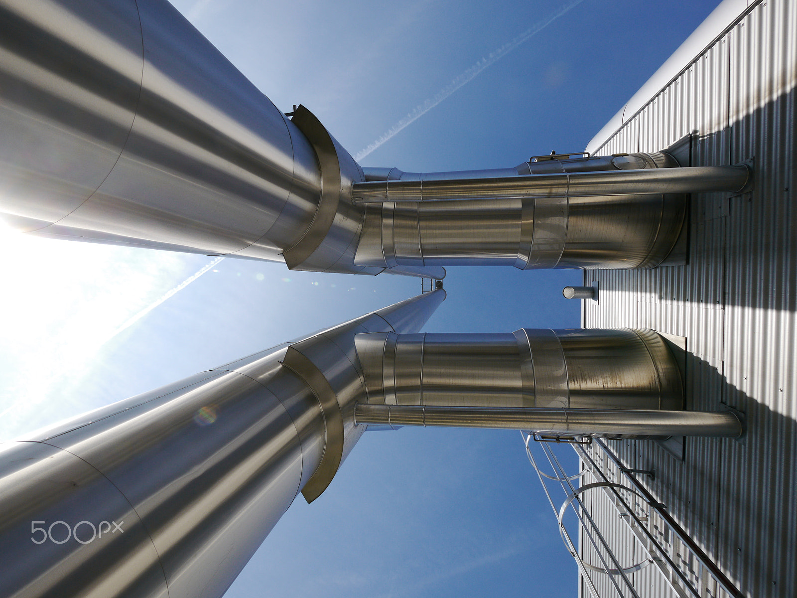 Panasonic Lumix DMC-GH2 sample photo. Lot of grey steel pipes photography